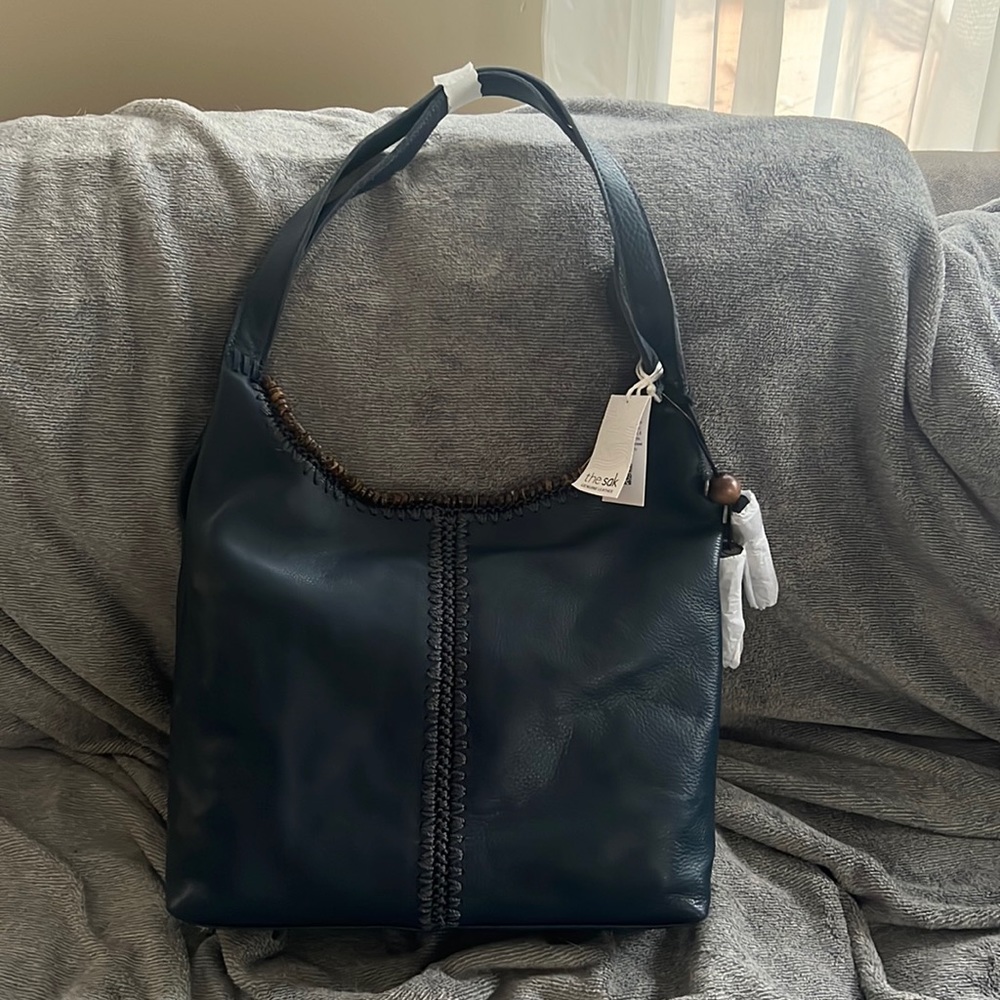 New with tags: The Sak blue genuine leather purse